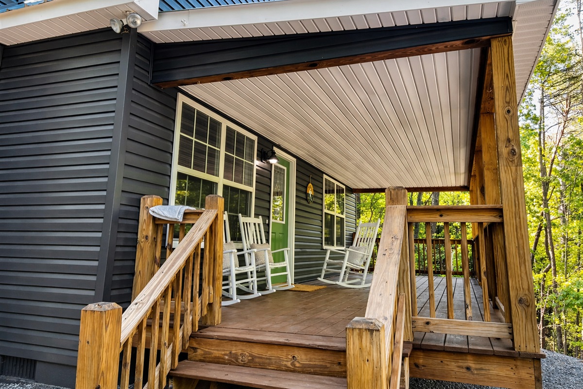 Welcoming front porch with rockers to enjoy the nature that surrounds you & mountain views.