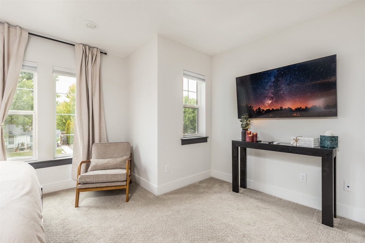 Front bedroom with a smart TV and candle lights to unwind from the day