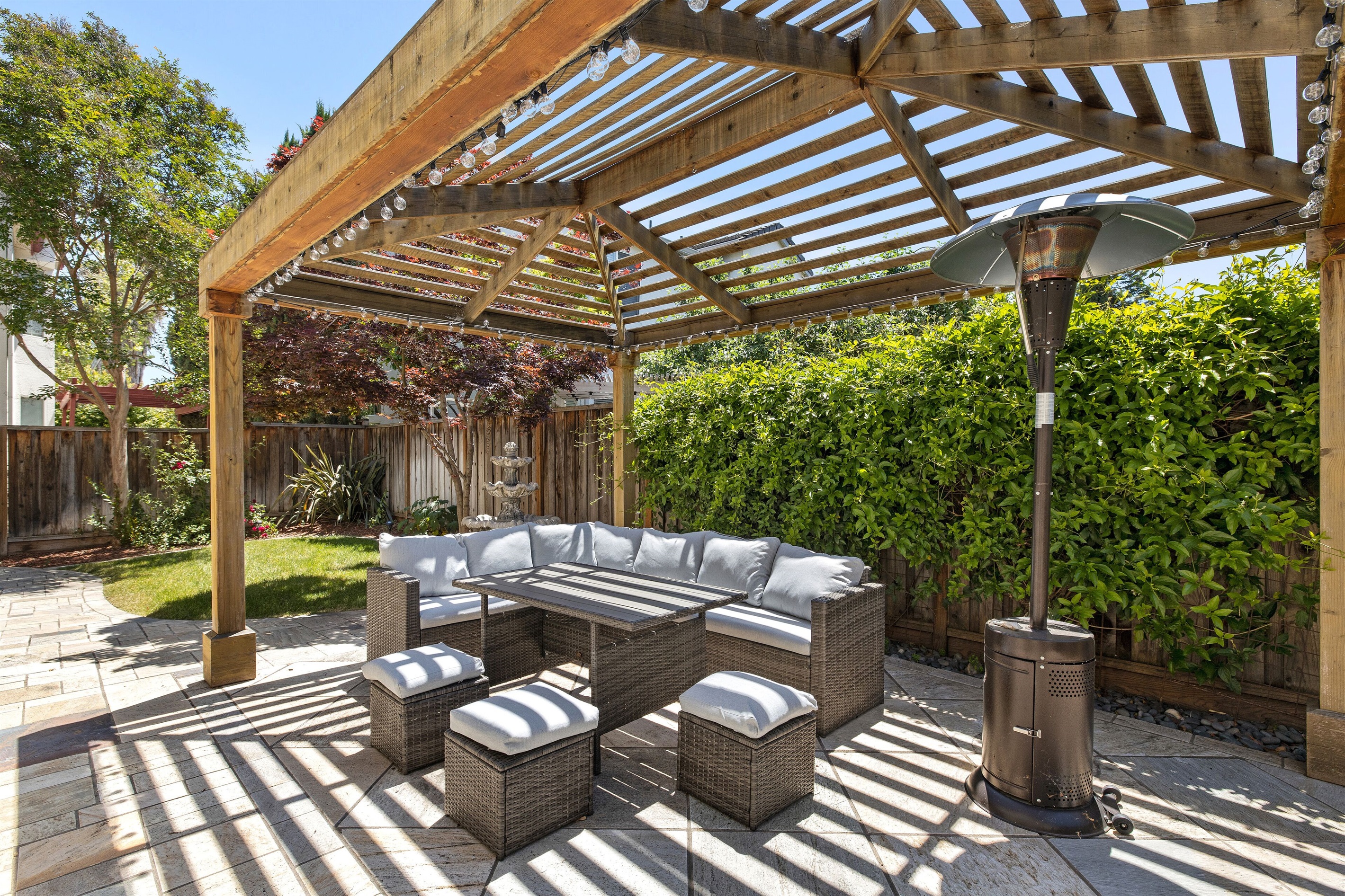 Relax and enjoy the outdoors in our charming backyard