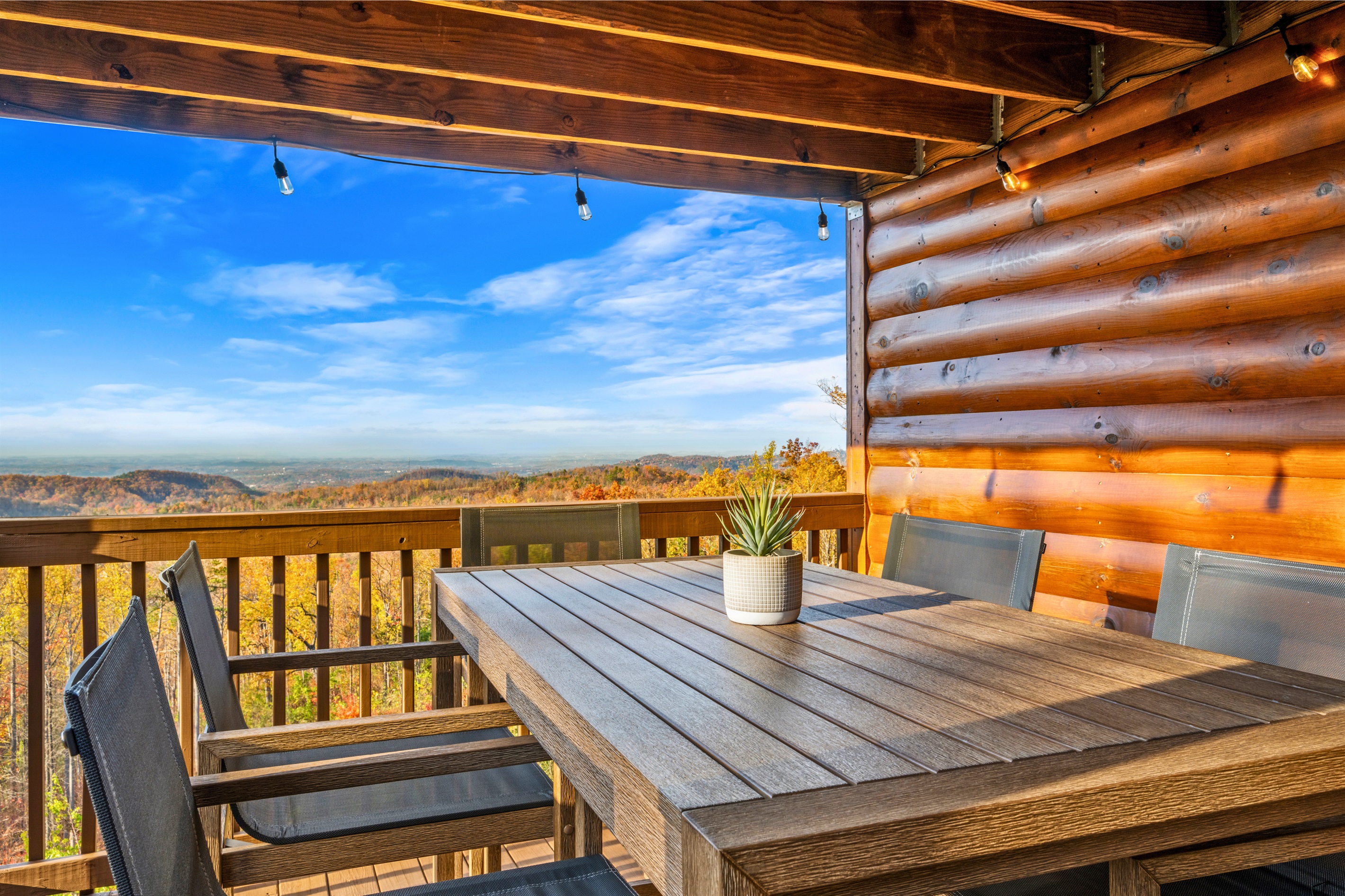Lower deck counter height table with comfortable chairs and stunning views