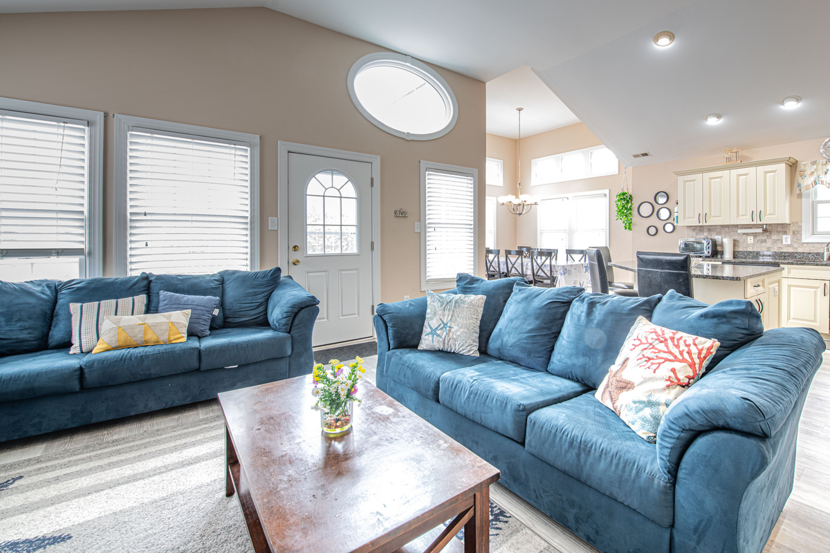 Open-Concept Living Room with Blue Sofas