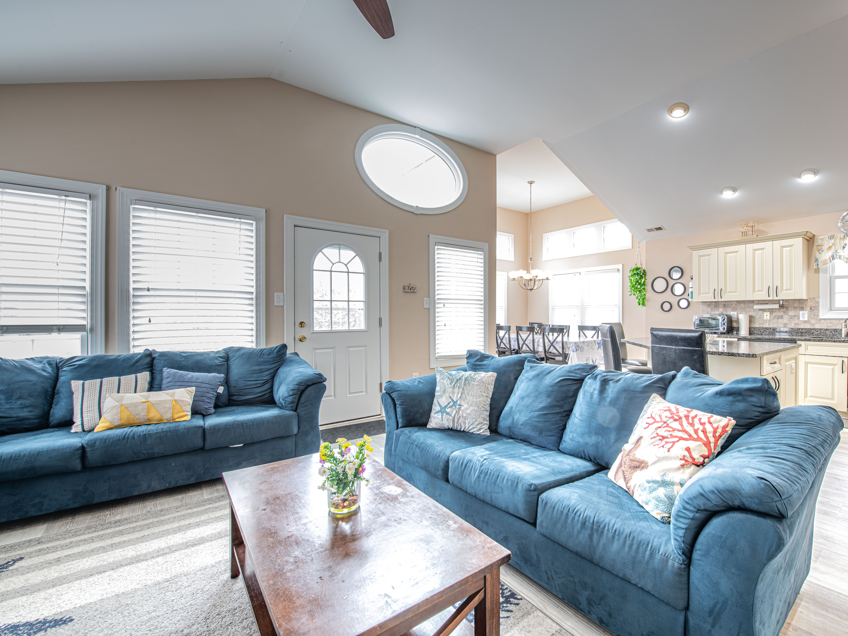 Open-Concept Living Room with Blue Sofas