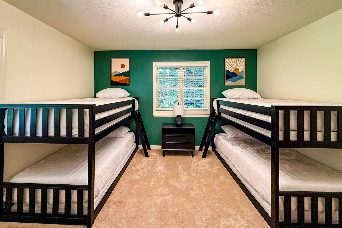 The bunk room is on the upper level complete with 4 twin bunks. Please note that top bunks will have linens provided but will not be made.
