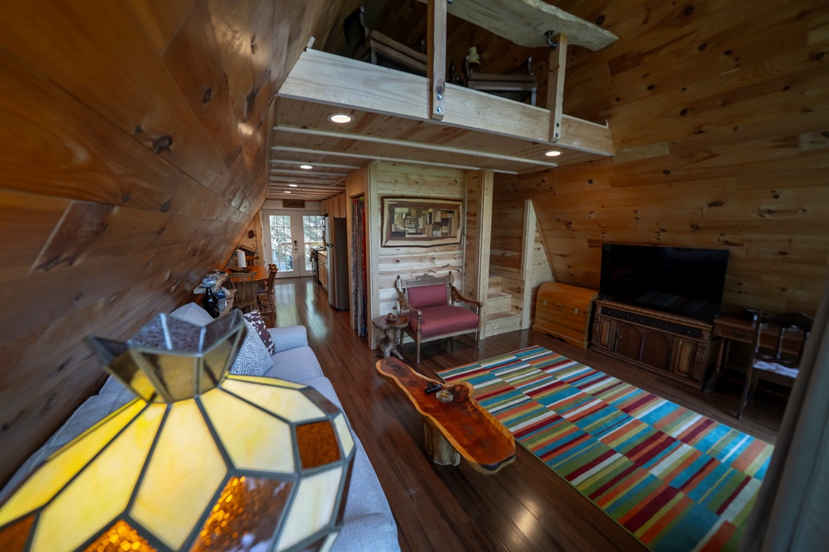 Kick back and relax with your favorite shows on the smart TV, all while enjoying the natural light and peaceful wooded views.