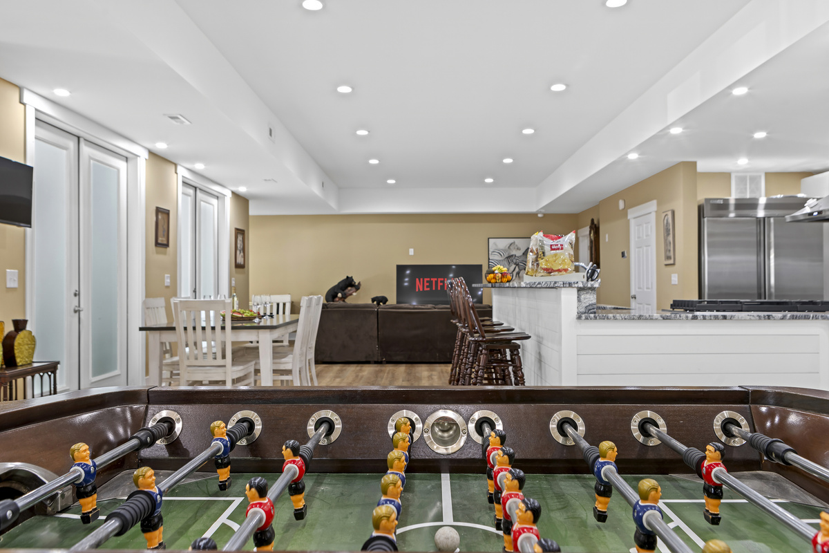 Game Room: Enjoy friendly competitions with foosball and unwind in style with Netflix!
