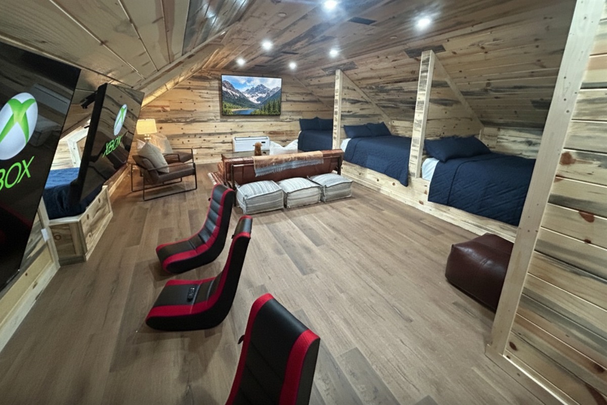 Upstairs kids room with 3 TV's and 2 XBoxes