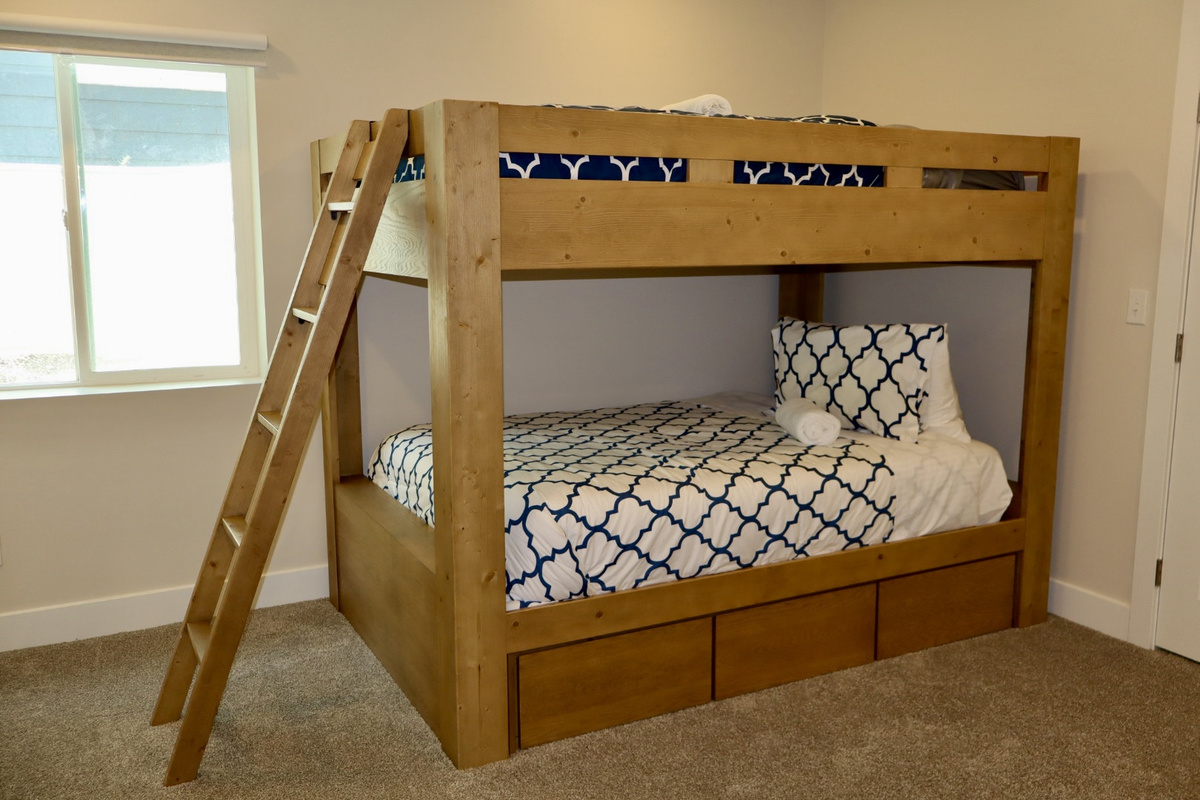 The fifth bedroom is perfect for kids or extra guests, featuring a sturdy bunk beds with two full-size mattresses.