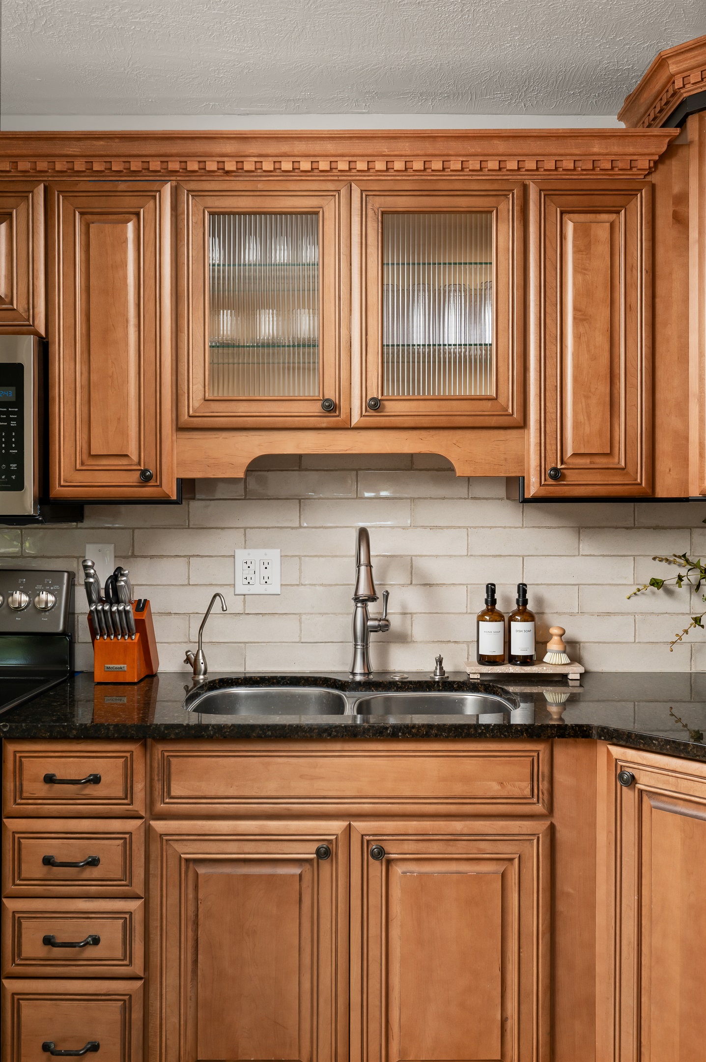Newly renovated kitchen featuring modern finishes, updated appliances, and everything you need to cook and gather comfortably during your stay.