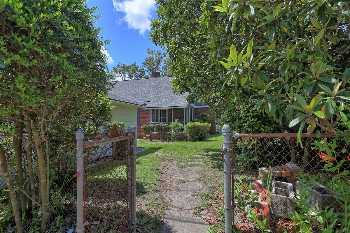 Enter through the gated yard for a touch of privacy and a charming welcome to your home away from home.