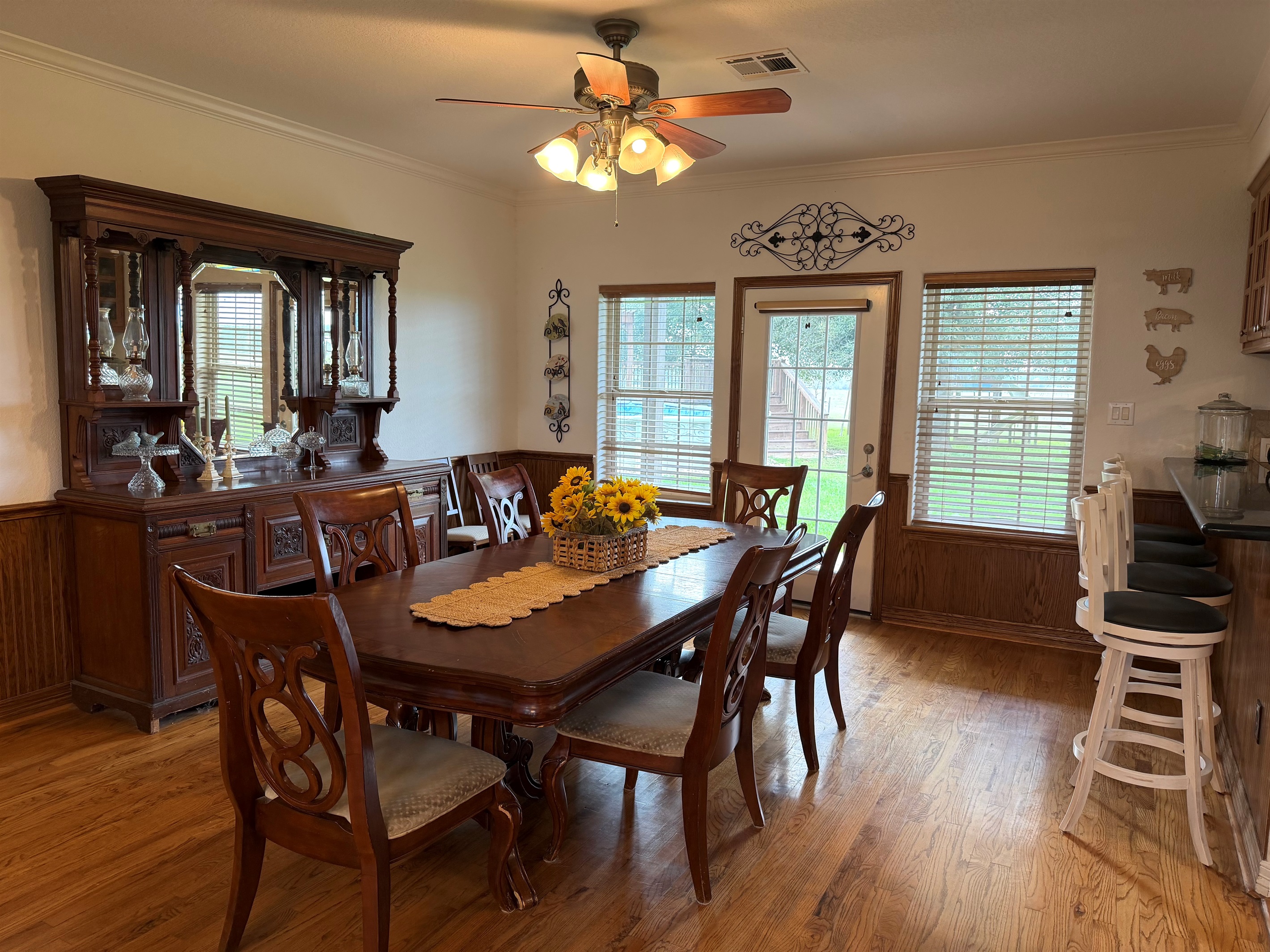 Dining room with separate barstool seating area.