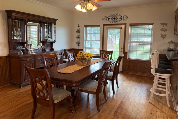 Dining room with separate barstool seating area.