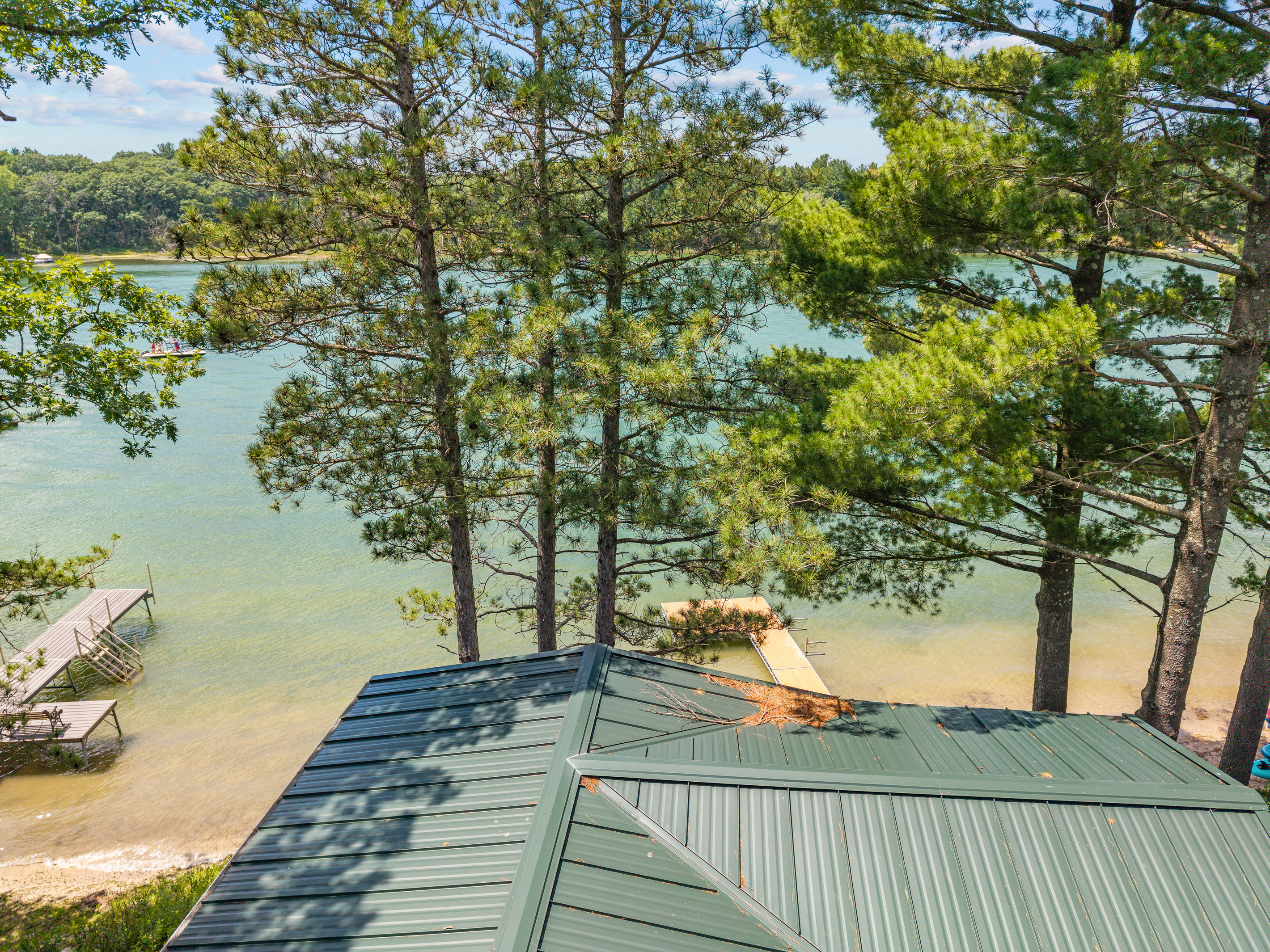 Take in sweeping lake views from the comfort of your bed in this charming upstairs space.