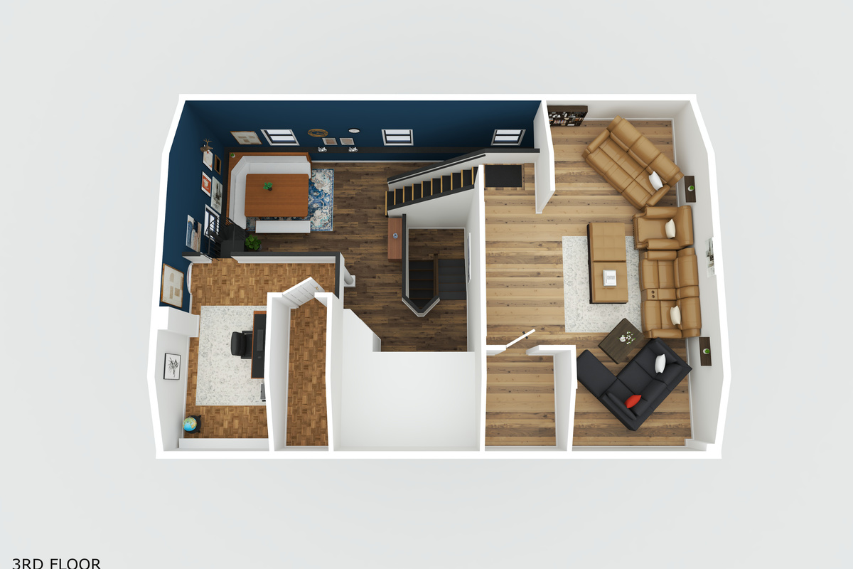 Head up one more level to two open loft spaces - one made for movie nights (on the right) and the other set up as a dedicated office (on the left) with both overlooking the second floor below.