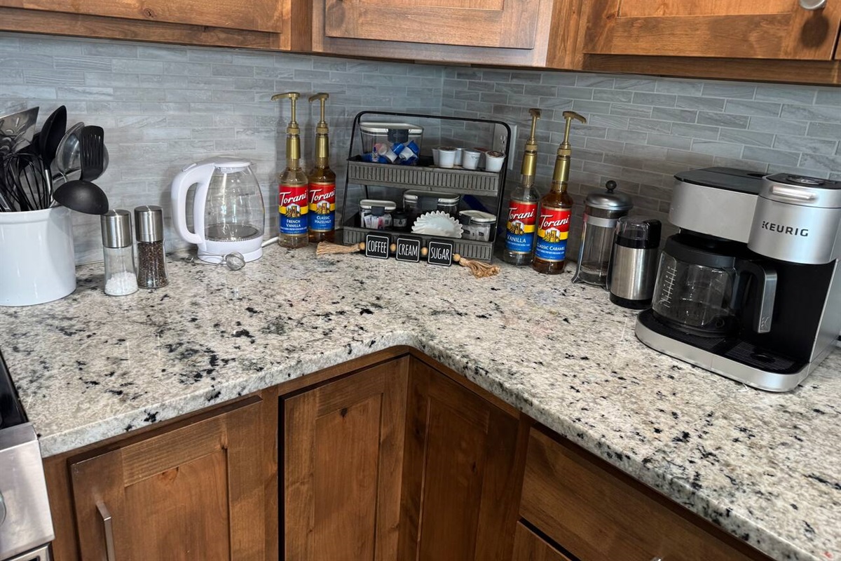Fully stocked coffee bar with syrups and local blends.