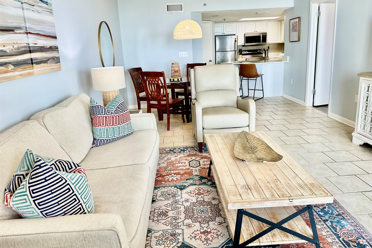 View from living room looking into kitchen and dining area.