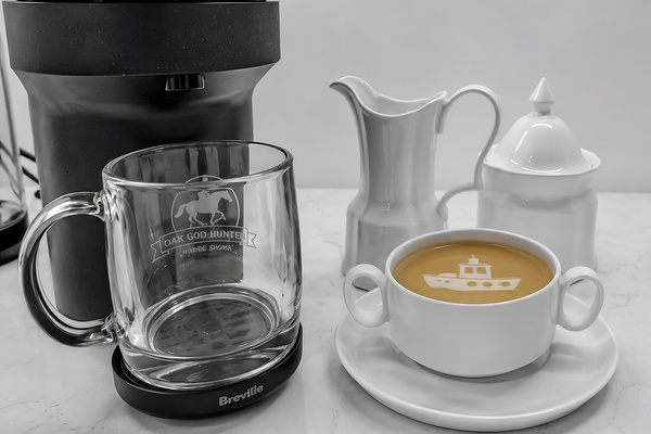 Enjoy freshly brewed coffee or tea with the provided coffee maker, mugs, and serving essentials.