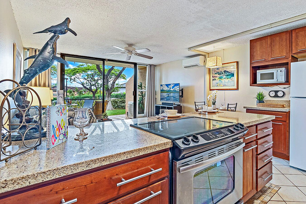 Open concept kitchen with quartz countertops.