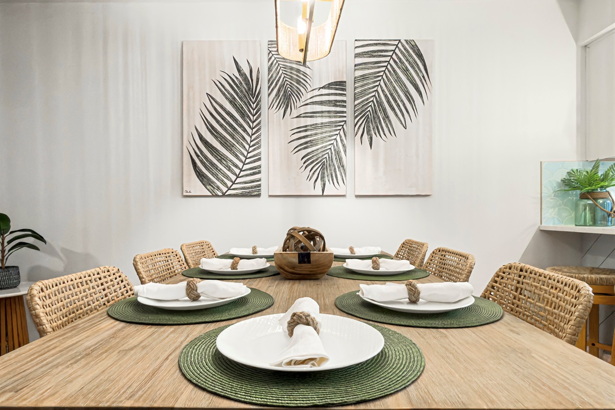 Share stories and local takeout around this sturdy dining table. There is plenty of elbow room for everyone to dine comfortably. Relax here with a glass of wine before bed.