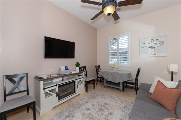 Comfortable sofa and dining space with natural light