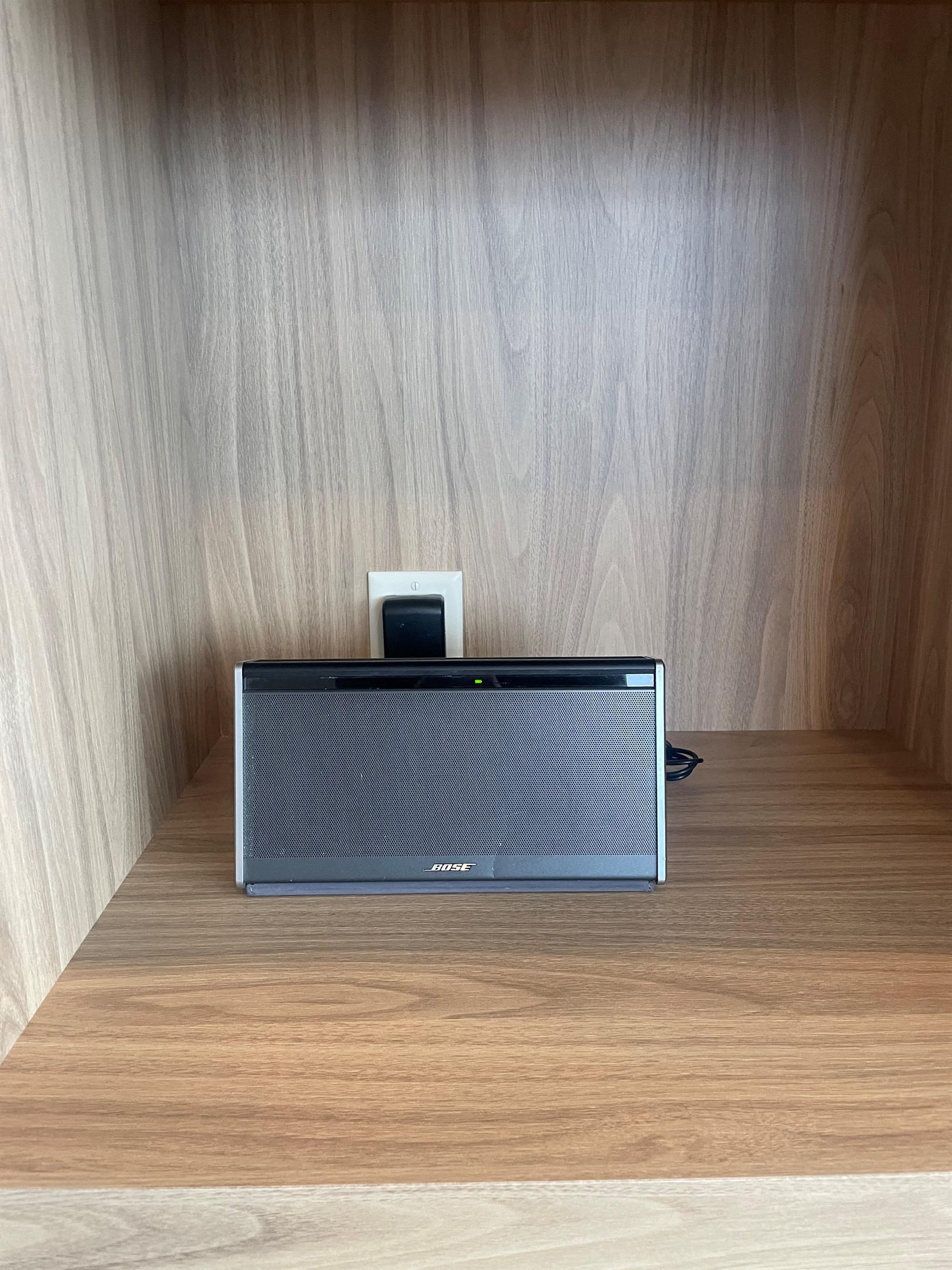 Set the mood with a premium Bose speaker, perfectly placed in the living room.