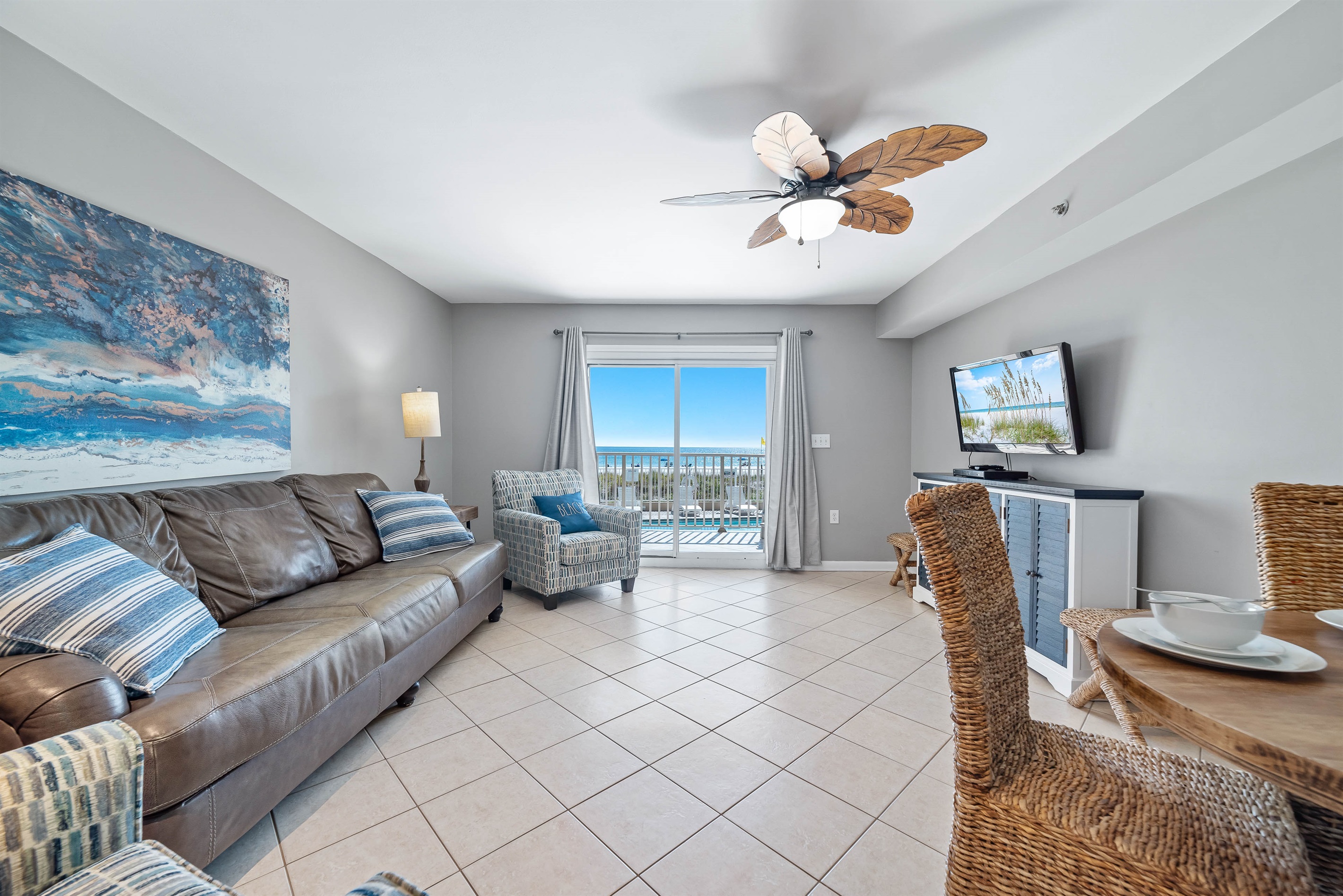 Experience coastal comfort in this beautifully appointed living room. Featuring a plush sleeper sofa for extra guests and direct access to your private balcony overlooking the serene waters.