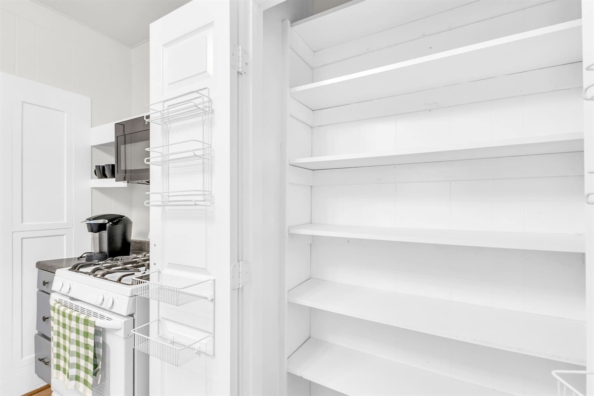 Pantry interior with ample shelf storage.