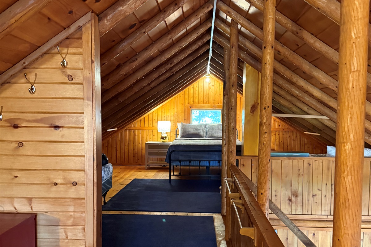 Upstairs is the second king bed on the right, also a Zinus memory foam mattress.