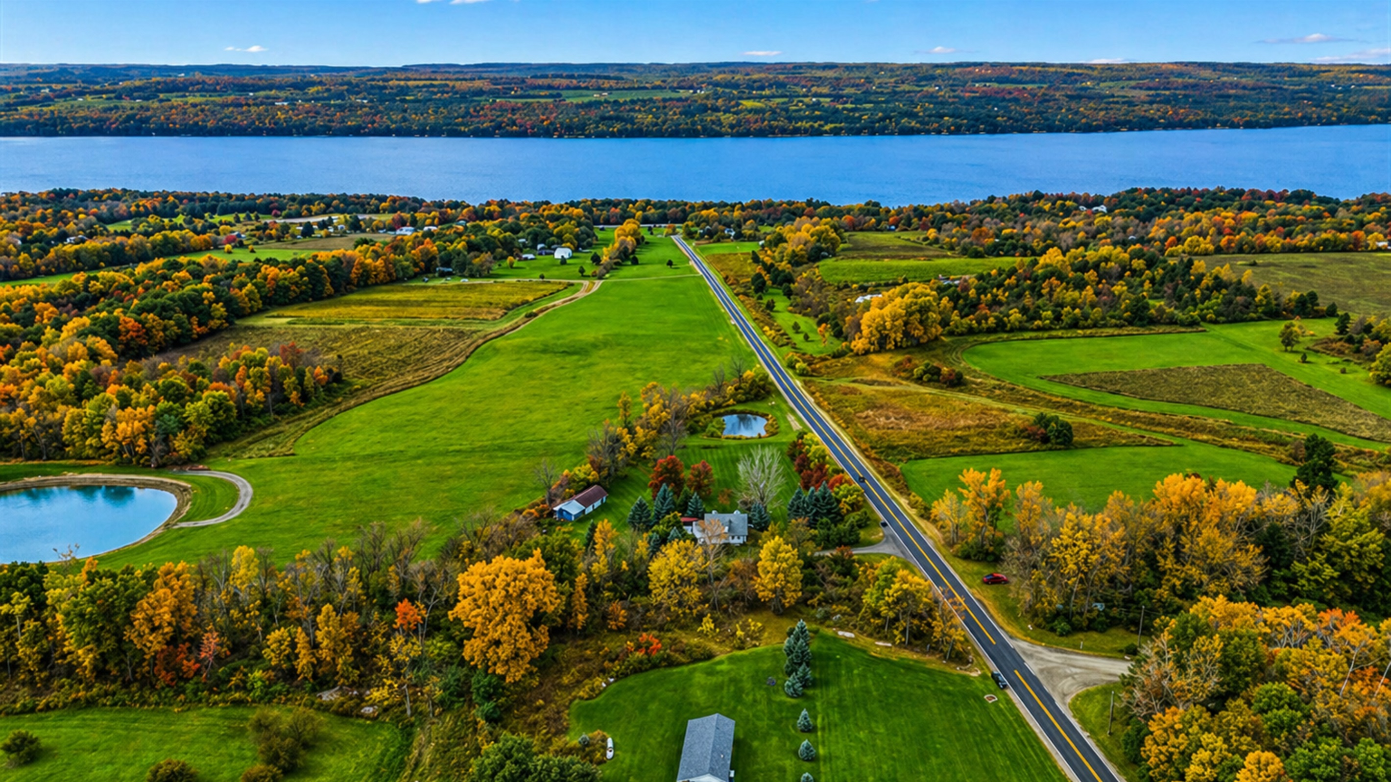 A stunning aerial shot capturing the entire property and its surroundings from above.