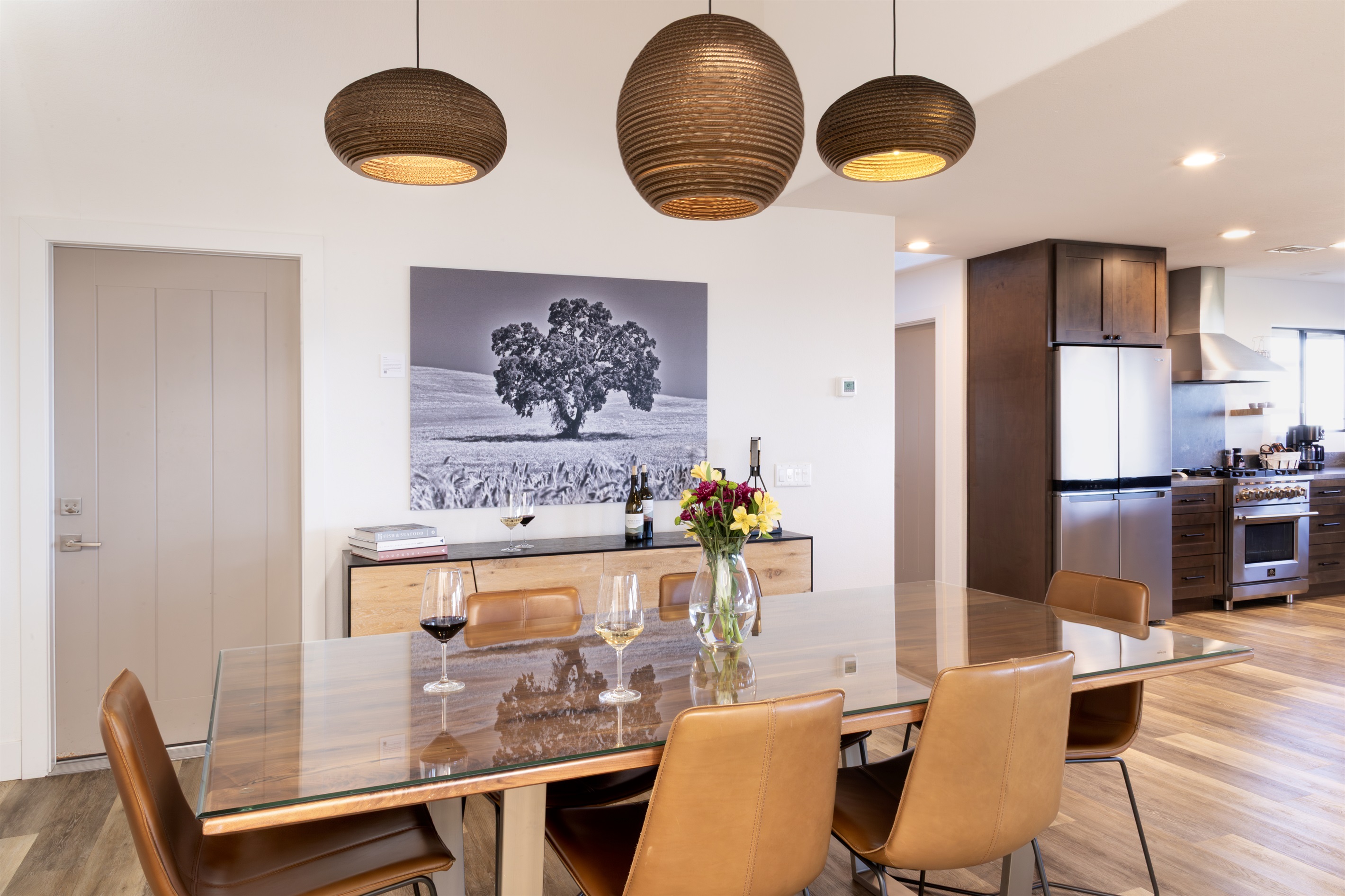 An entertainer's dream — the open-plan dining room flows effortlessly into the chef's kitchen, so the conversation never has to stop.