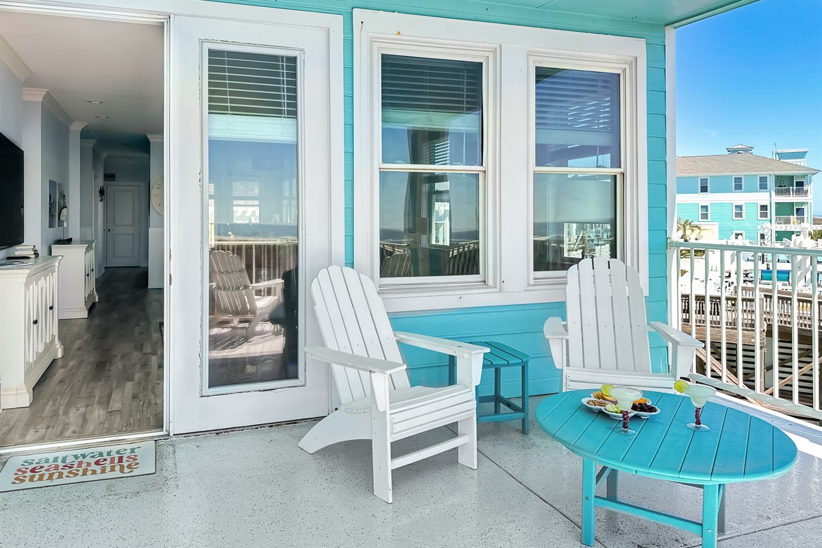 The living room opens up to the spacious main patio.