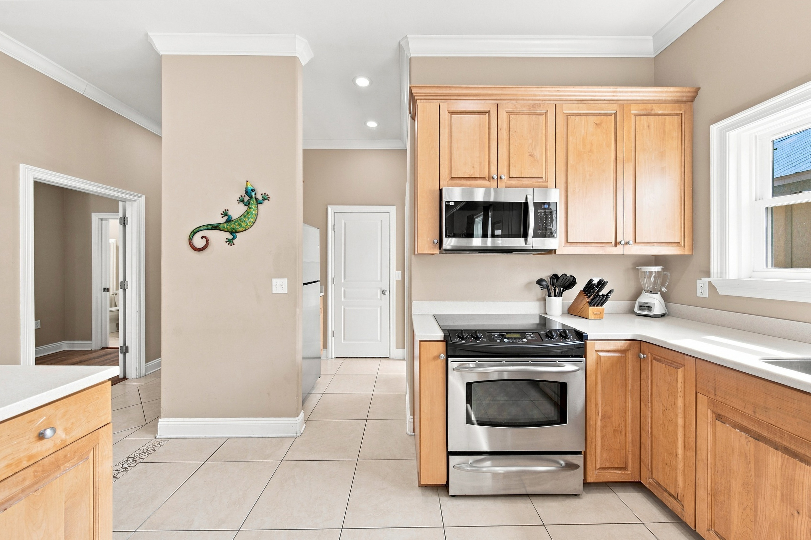 Kitchen with stainless steel range and ample counter space