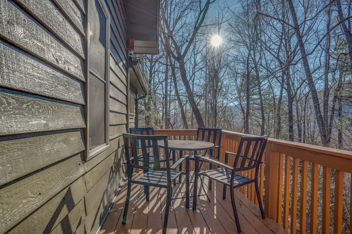 Back deck of home with outdoor seating
