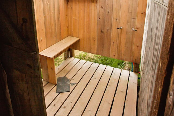 Private outdoor cedar shower with hot and cold water. Shower under the sun or stars.