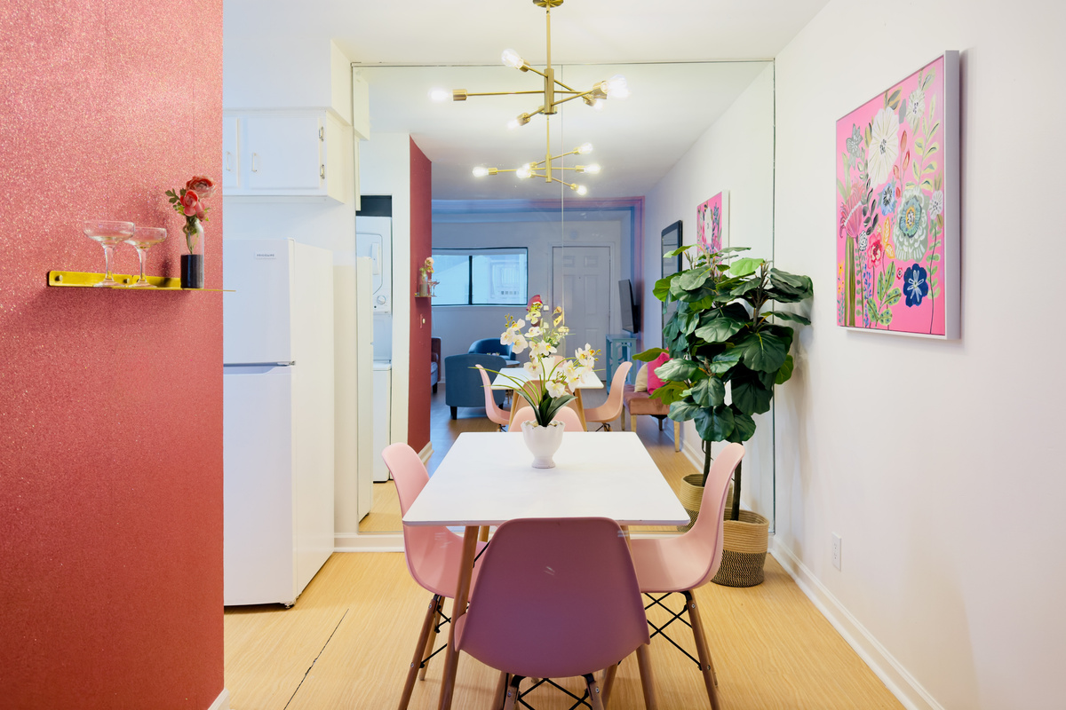 Dining for 4 and with a full wall mirror,