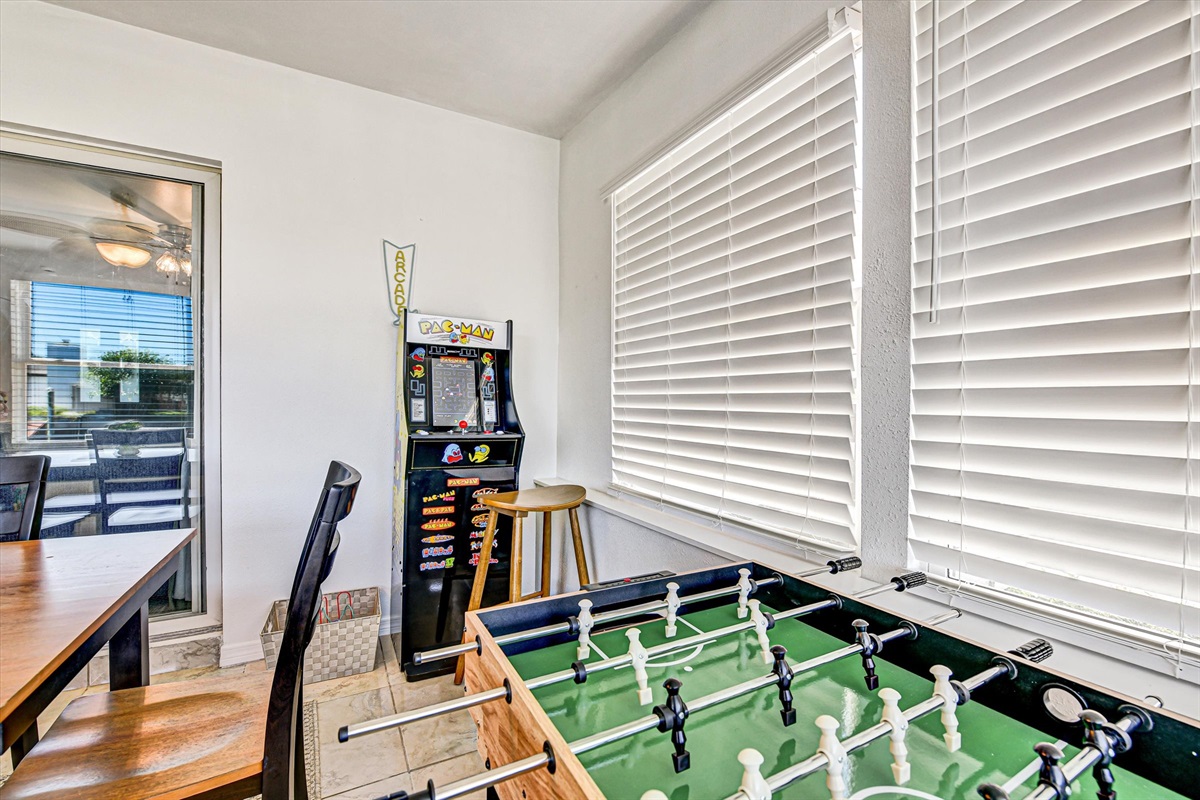 Dining seats 6 and FUN area! Pac-Man arcade game and foosball