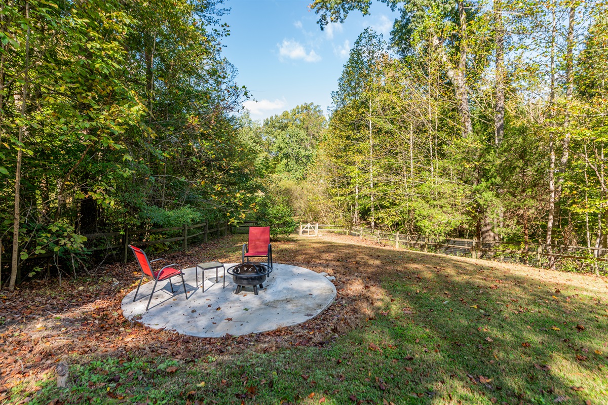 Outdoor Fire Pit: Gather around the fire pit for evenings under the stars!