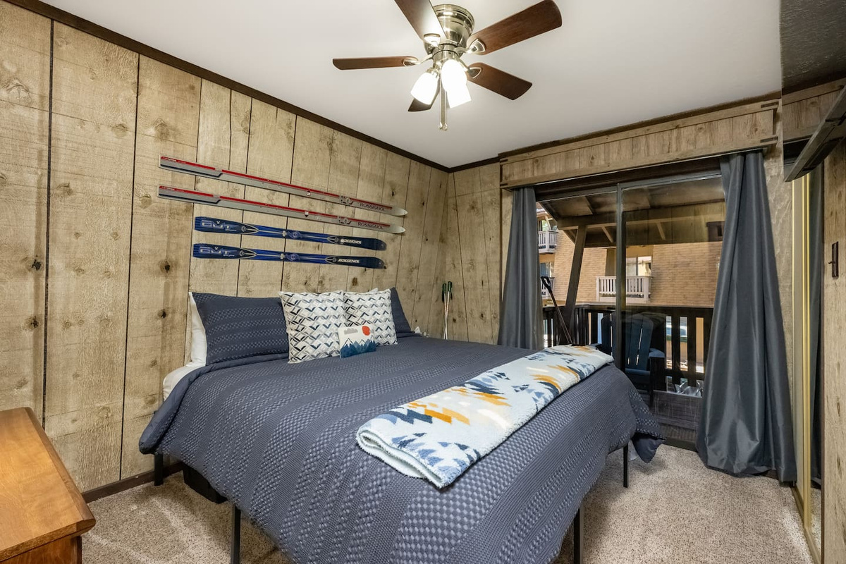 Bedroom #2 with sliding door access to back porch as well