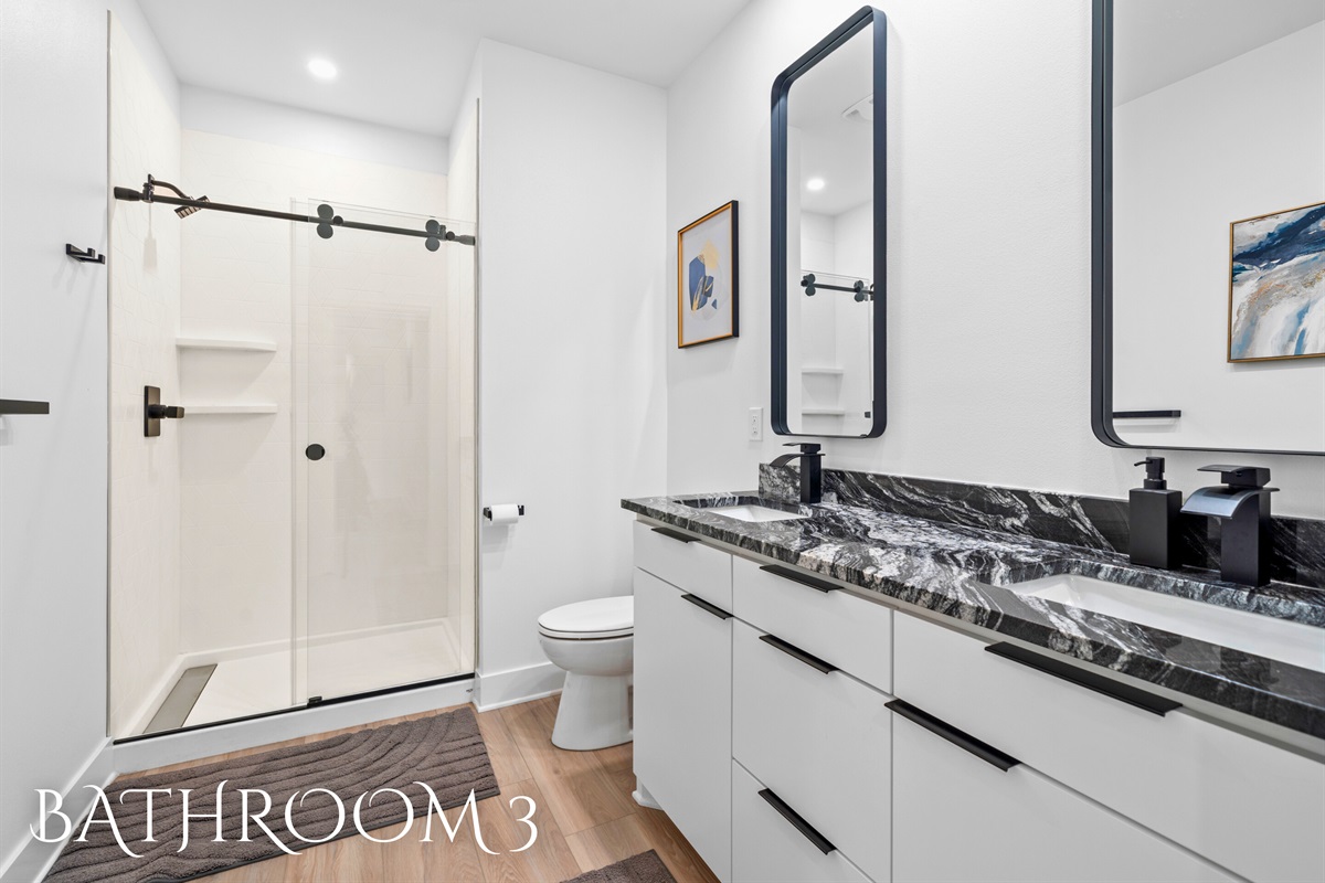 Start your day right in this luxurious bathroom. Elegant, spacious, and calming.
