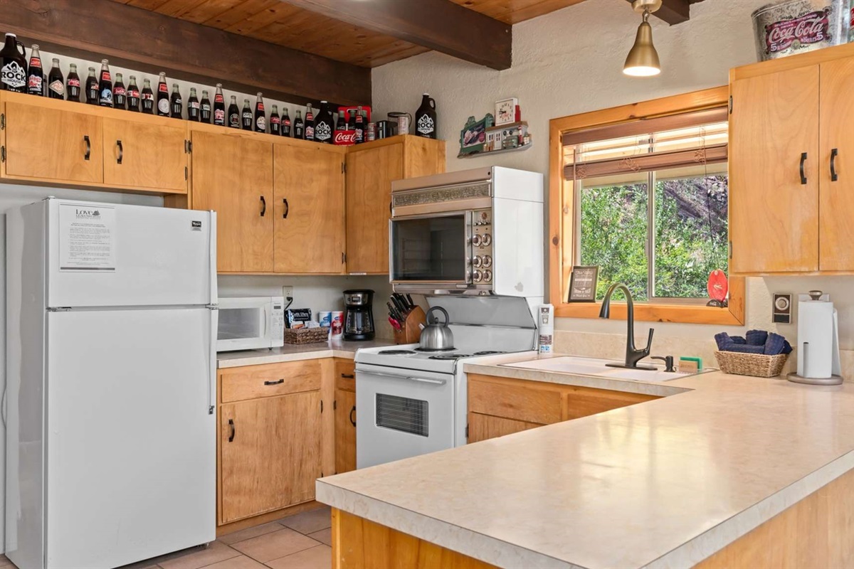Bright open kitchen with everything you need for home-cooked meals.