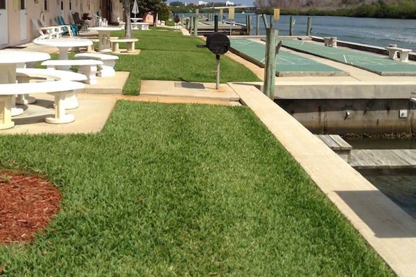 Another view of shuffle board and outdoor seating 