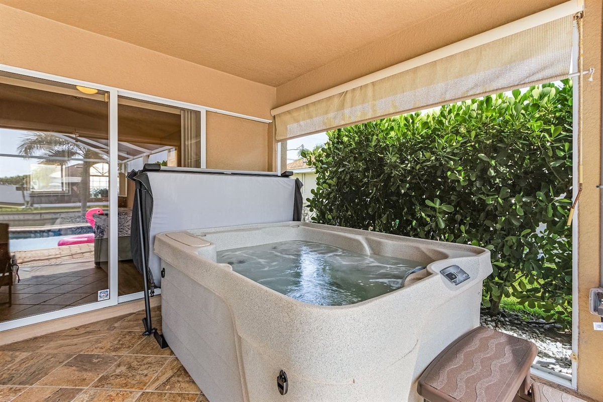 Relax in the bubbling hot tub, let your worries melt away, and get your drink ready to enjoy peaceful water views!