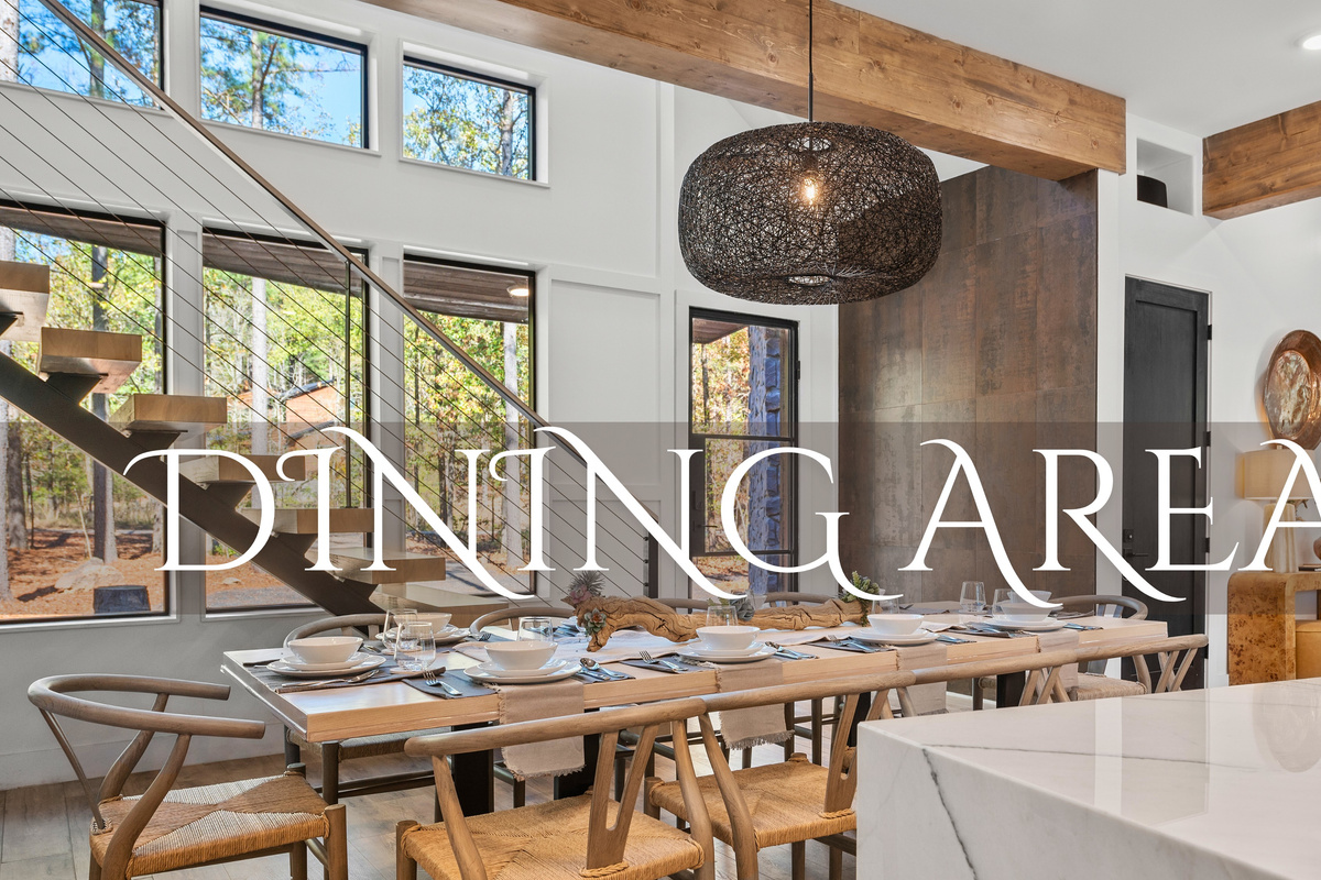 Gather in this inviting dining area with expansive windows that offer stunning views. Every meal here becomes an experience to savor and remember.