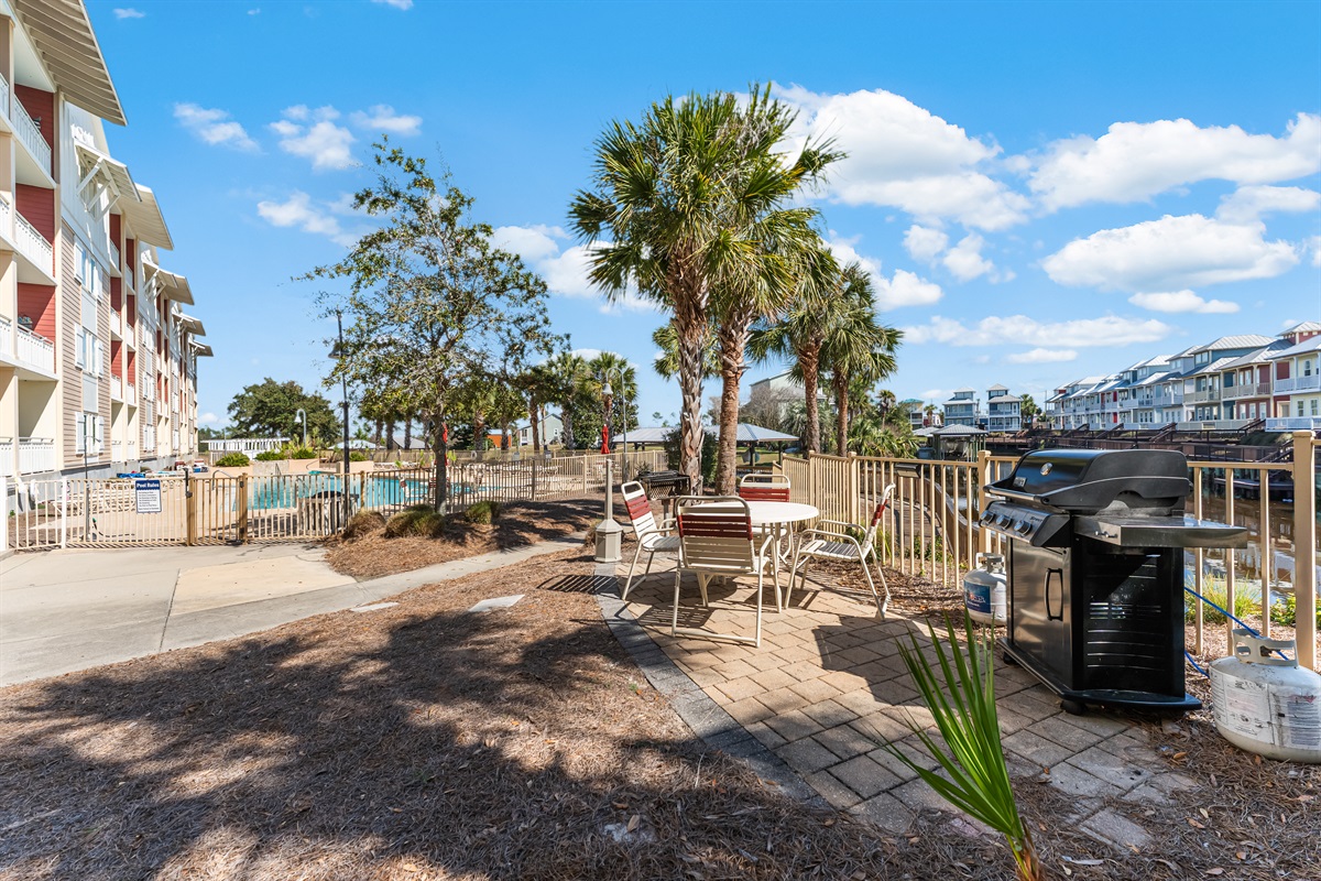 Community gas & charcoal grill area. 