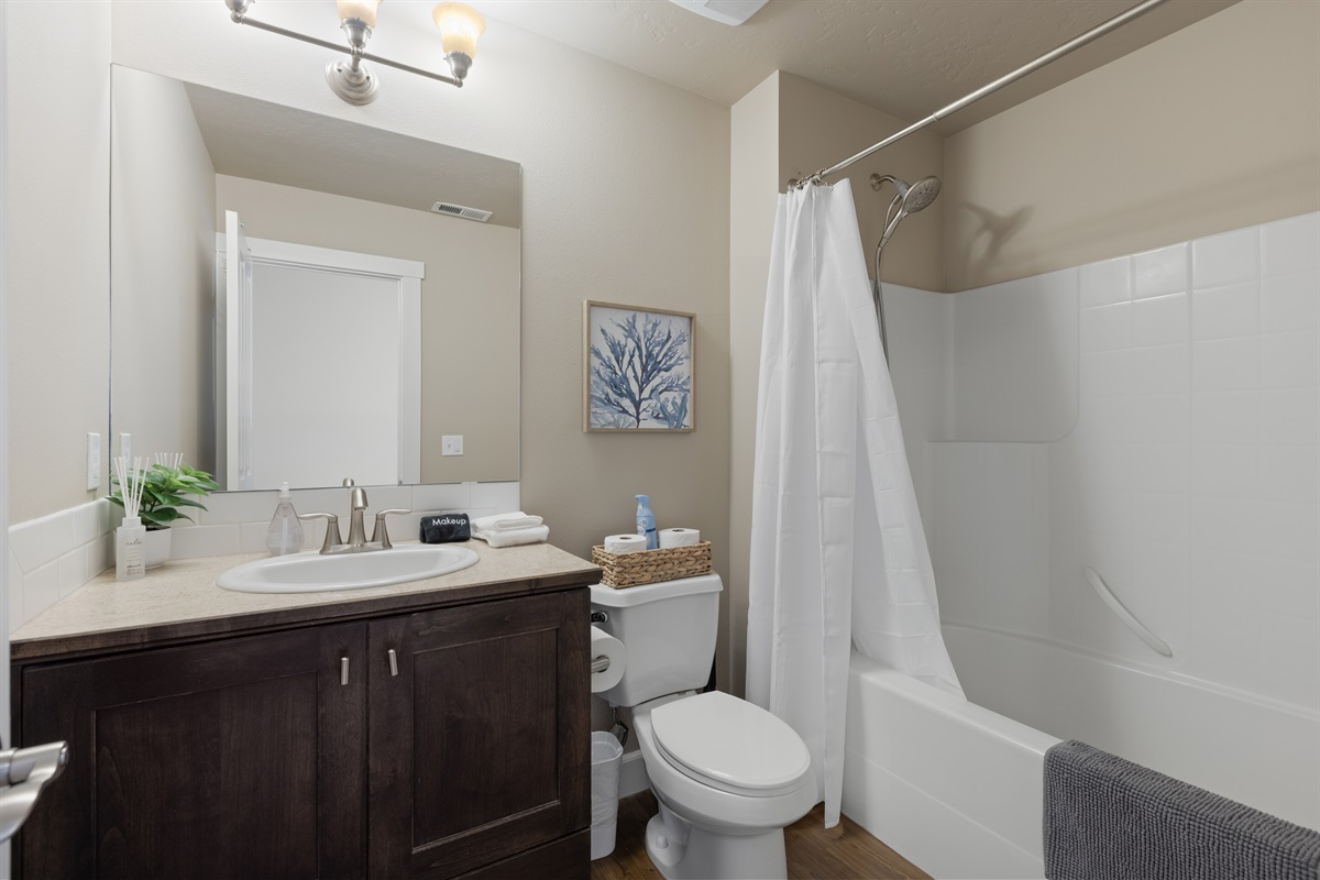 Fresh, bright guest bathroom.