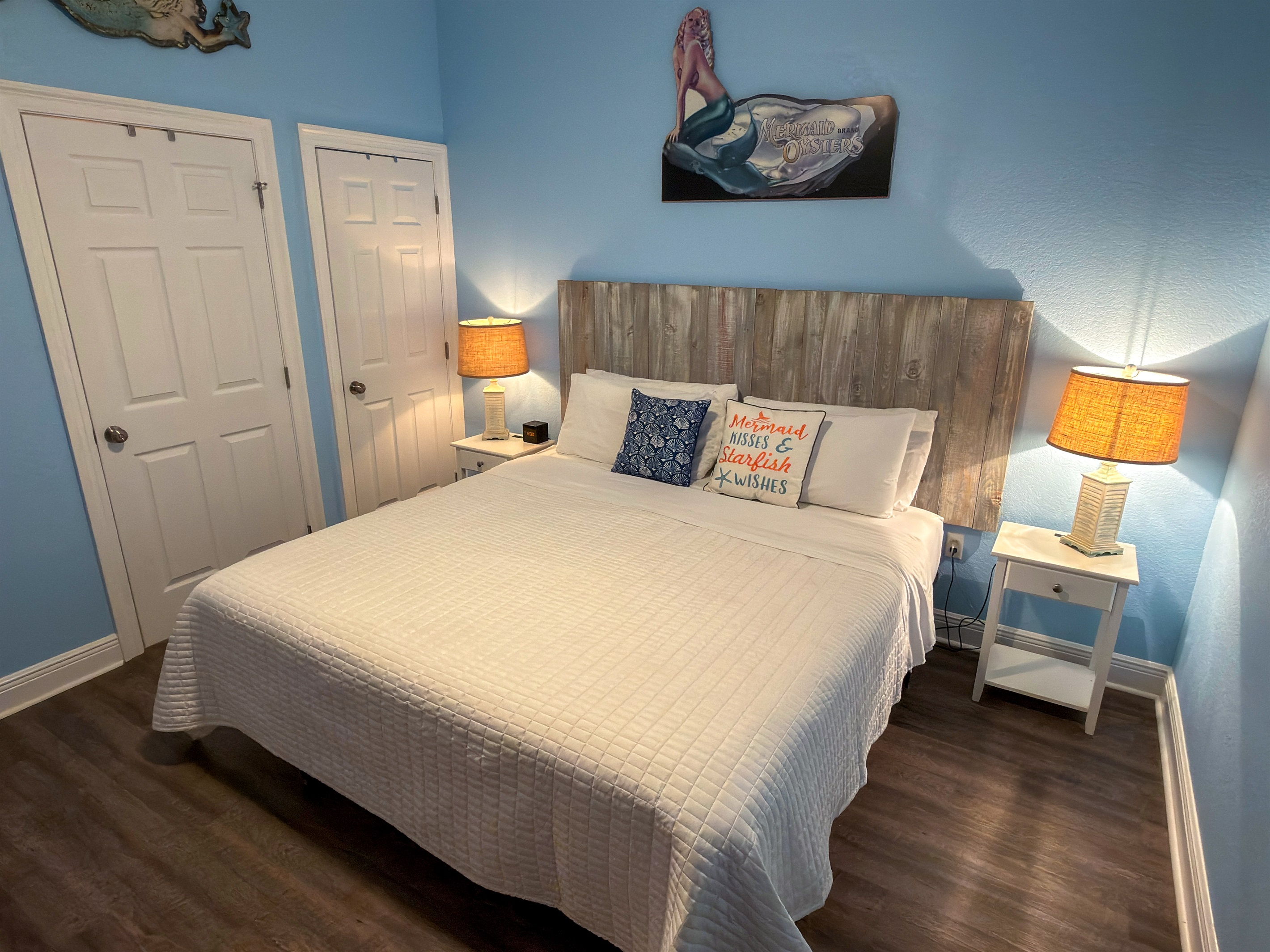 Beach-inspired artwork and seaside décor give this retreat a lighthearted charm that instantly feels like vacation.