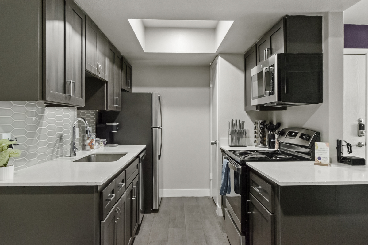 Fully equipped kitchen with modern appliances designed to make cooking and dining at home simple and enjoyable