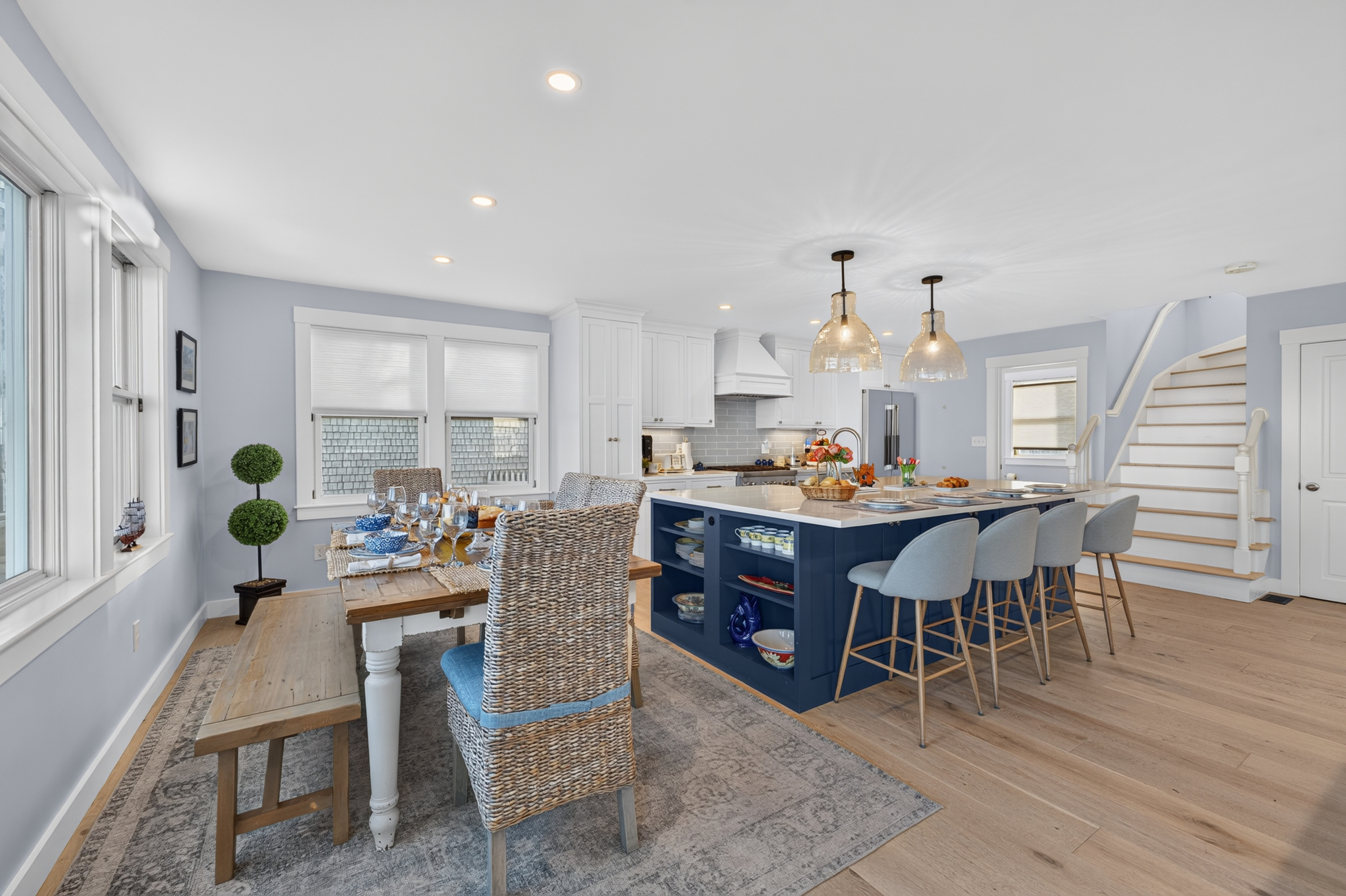 Open dining area seamlessly connected to the kitchen and living room