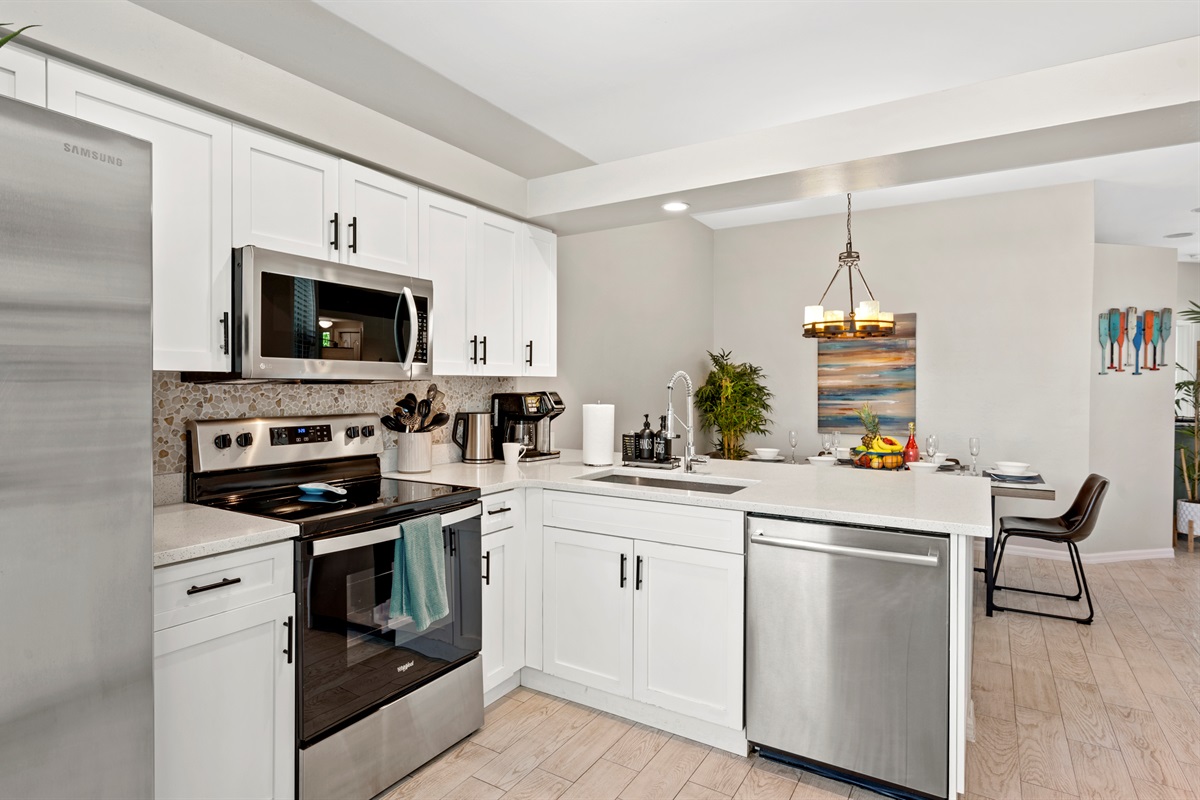 Bright and spacious kitchen with stainless steel appliances