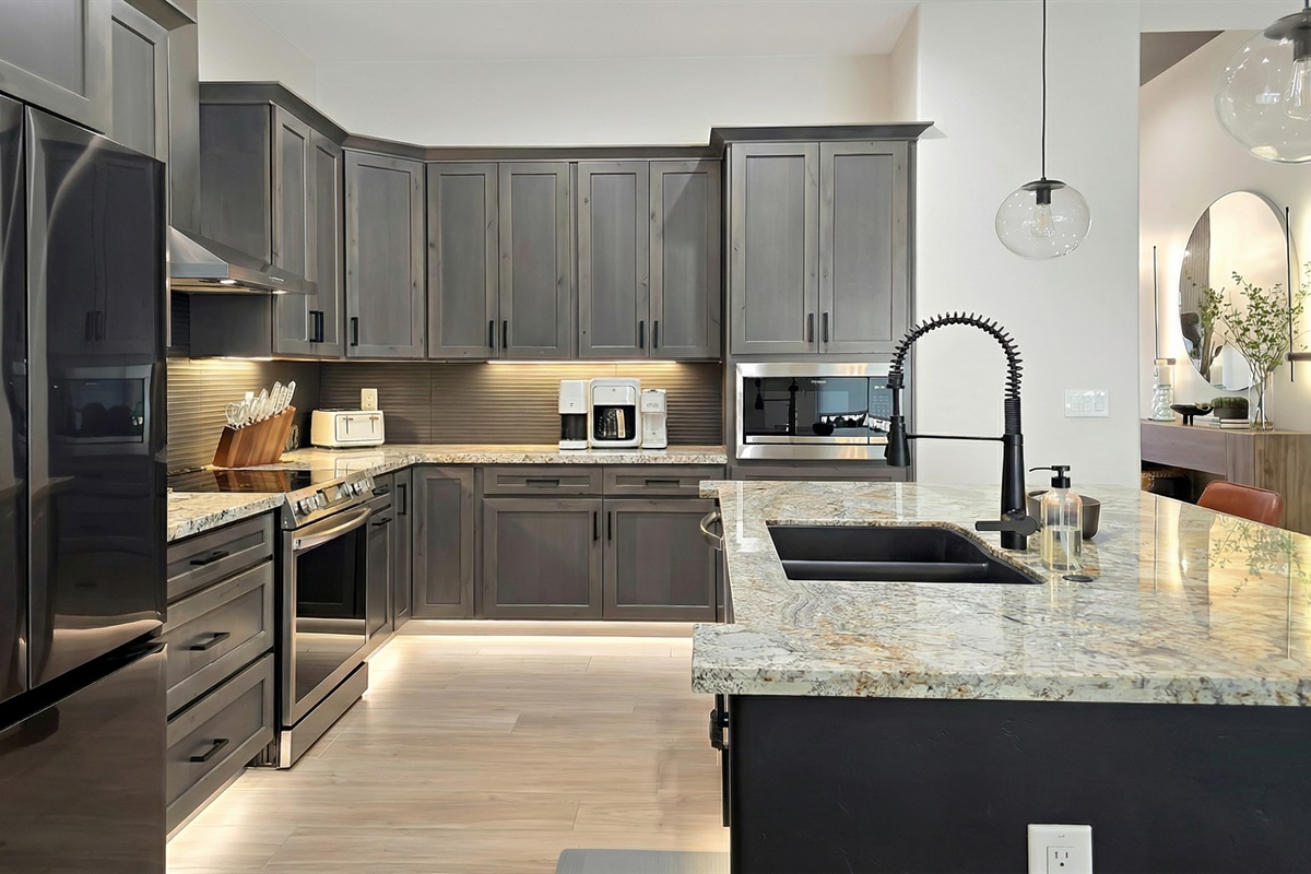 Modern and stylish kitchen with island.