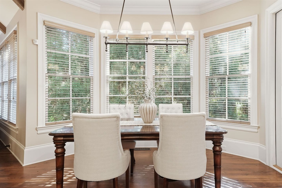 Cozy breakfast nook just off the kitchen, seating four comfortably. A warm, intimate space perfect for casual meals, morning coffee, or relaxed conversations.